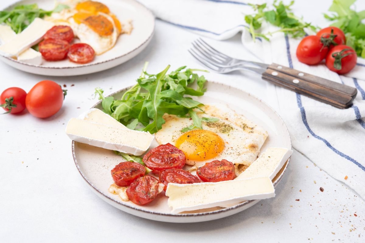 Keto Budget-Friendly Breakfast with Fried Eggs and Brie Cheese